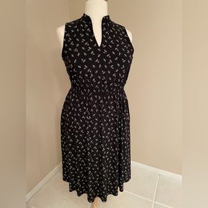 Black dress with tan floral details